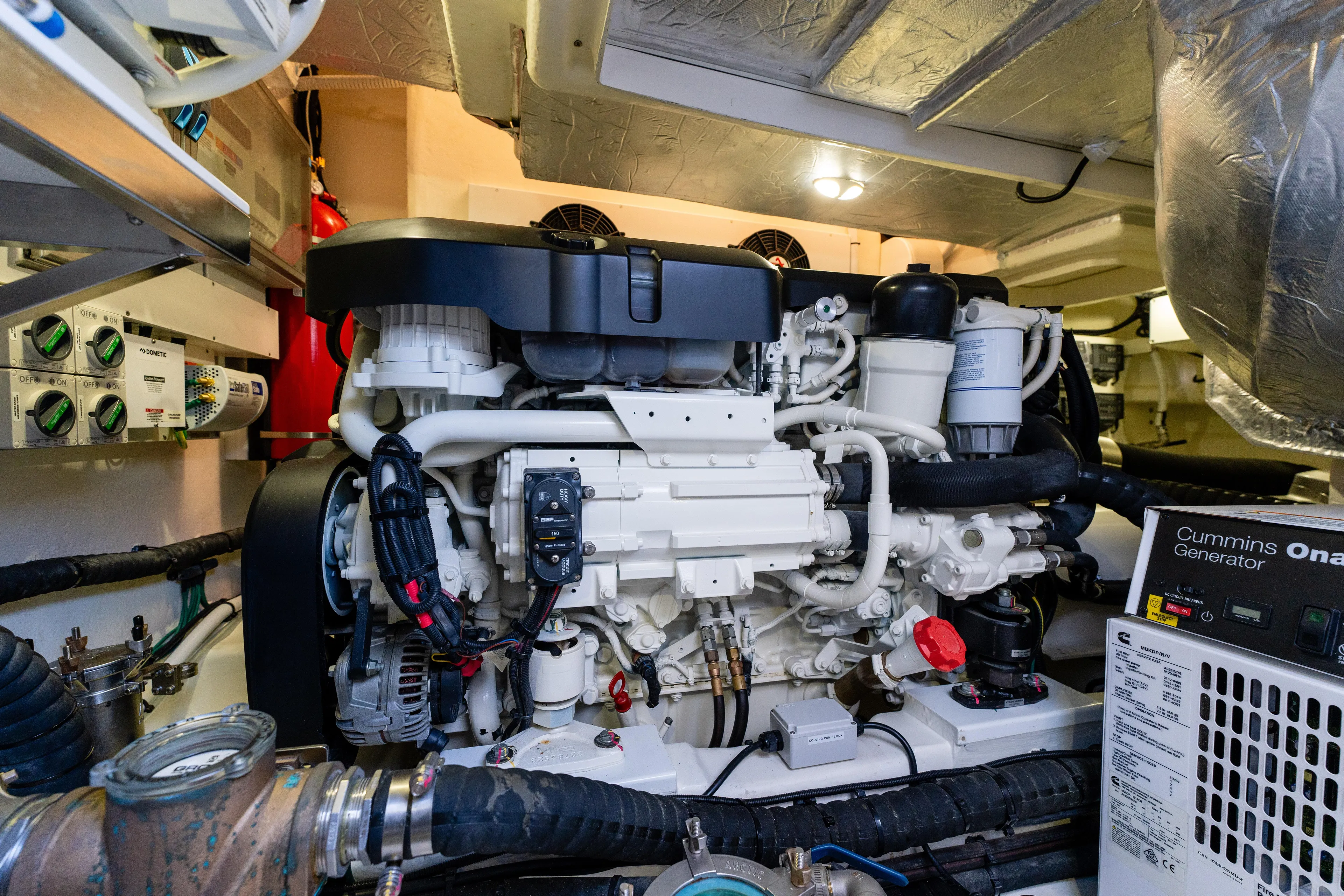 Ventures64 Yacht Photos Pics Engine room of 2022 Riviera 4800 Sport Yacht with Cummins generator.