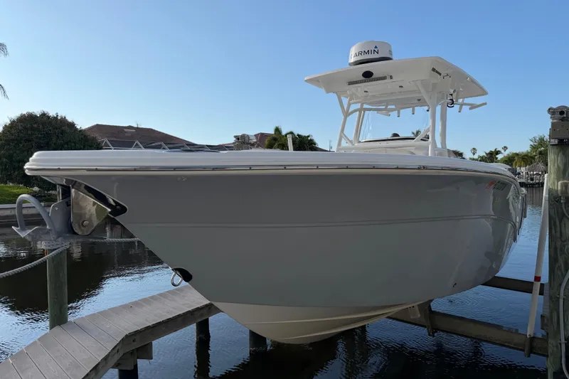  Yacht Photos Pics 2022 Sea Fox 288 Commander boat docked by waterfront.