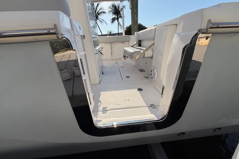  Yacht Photos Pics 2022 Sea Fox 288 Commander boat interior with seating and open deck view.