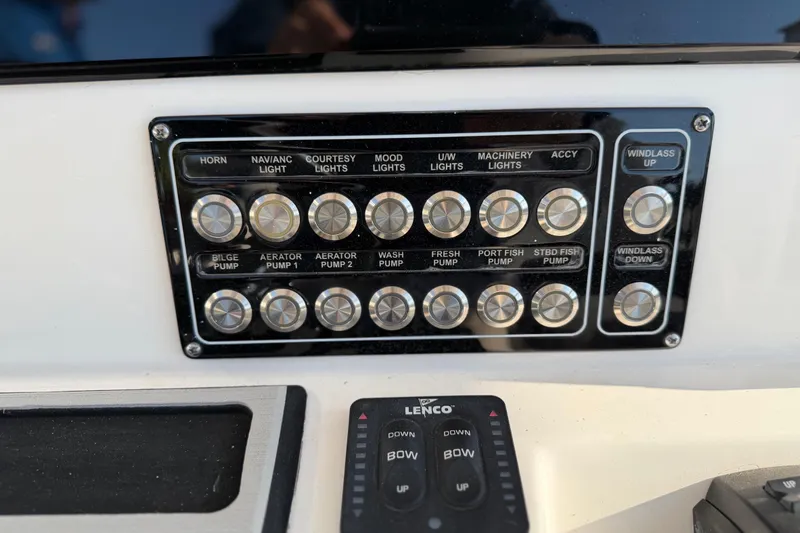  Yacht Photos Pics Control panel of a 2022 Sea Fox 288 Commander boat with labeled switches.