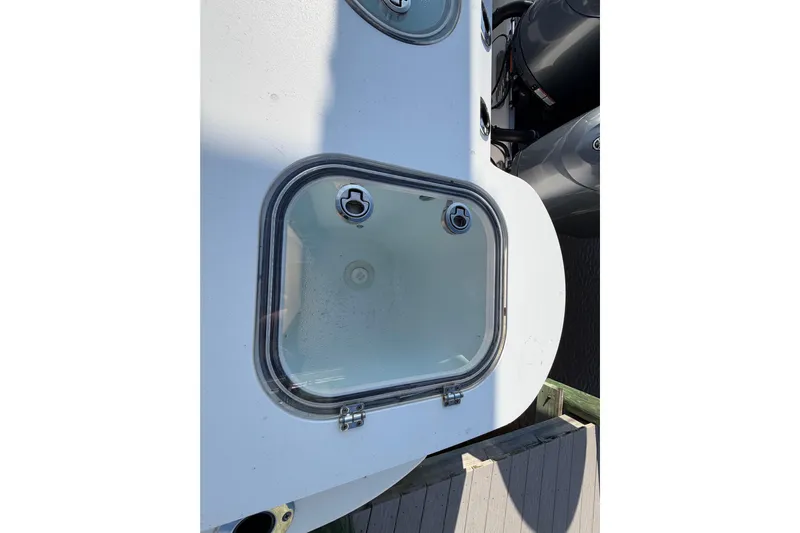  Yacht Photos Pics 2022 Sea Fox 288 Commander boat hatch with dual outboard motors.