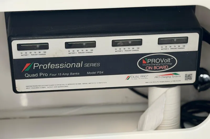  Yacht Photos Pics Battery charger display on 2022 Sea Fox 288 Commander boat, showing charge levels for four batteries.