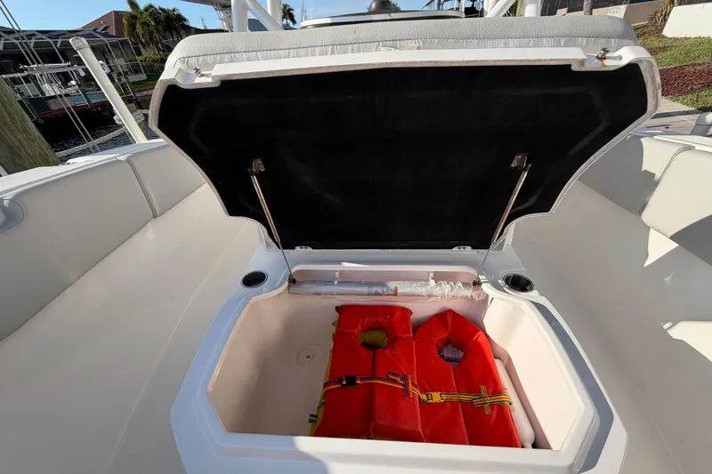  Yacht Photos Pics Open storage compartment on 2022 Sea Fox 288 Commander boat with life jackets inside.