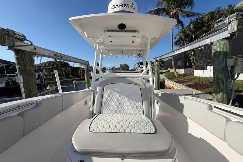  Yacht Photos Pics 2022 Sea Fox 288 Commander boat interior with seating and Garmin equipment.