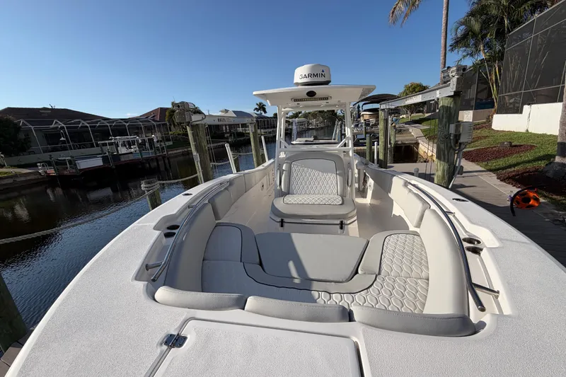  Yacht Photos Pics 2022 Sea Fox 288 Commander boat docked, featuring spacious seating and modern design.