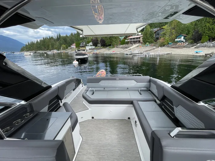  Yacht Photos Pics 2020 Cobalt A29 boat interior with lake view, featuring sleek seating and modern design.