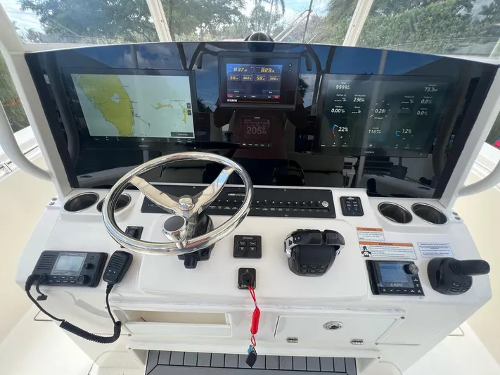  Yacht Photos Pics Helm of 2020 Cobia 350 boat with advanced navigation and control systems.