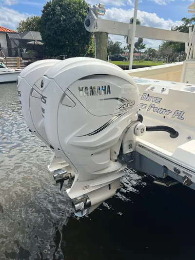  Yacht Photos Pics 2020 Cobia 350 with twin Yamaha outboard engines docked in a marina.