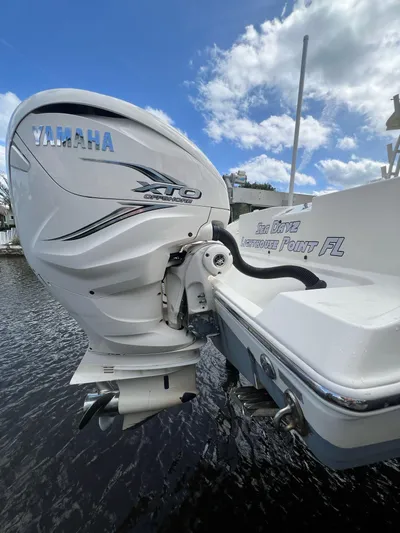  Yacht Photos Pics Cobia 350 boat with Yamaha XTO engine, 2020 model, on water under blue sky.