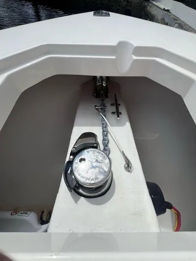  Yacht Photos Pics 2020 Cobia 350 boat anchor compartment with winch and chain.