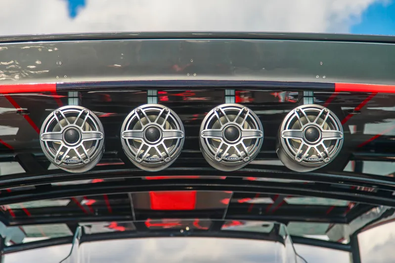  Yacht Photos Pics Four marine speakers on Concept 44' Open Deck boat, 2021 model, against a blue sky.