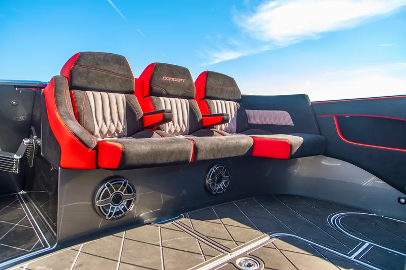  Yacht Photos Pics Luxurious seating on 2021 Concept 44' Open Deck boat with red and black upholstery.