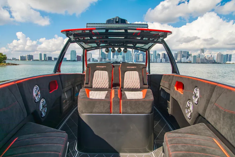  Yacht Photos Pics Luxurious 2021 Concept 44' Open Deck boat with modern seating and city skyline backdrop.