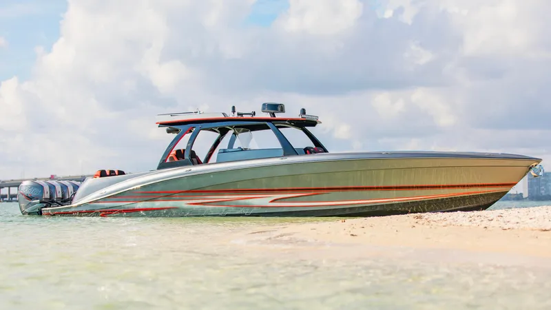  Yacht Photos Pics 2021 Concept 44' Open Deck boat on sandy beach with clear skies.