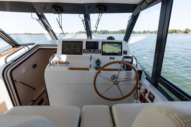 Middle Path Yacht Photos Pics Helm of 2023 MJM Yachts 4, featuring modern navigation and control systems.