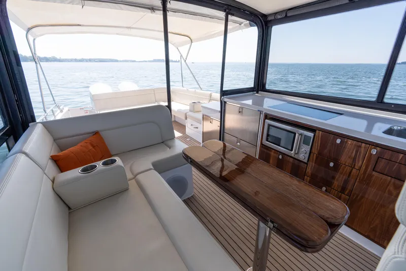 Middle Path Yacht Photos Pics Luxurious interior of 2023 MJM Yachts 4 with elegant seating and modern amenities.