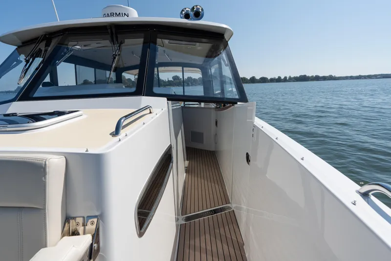 Middle Path Yacht Photos Pics 2023 MJM Yachts 4 on water, showcasing sleek design and spacious deck.