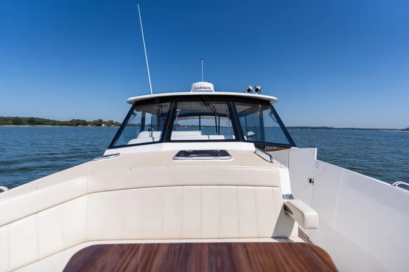 Middle Path Yacht Photos Pics 2023 MJM Yachts 4 on calm water, showcasing sleek design and modern features.