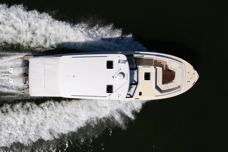 Middle Path Yacht Photos Pics Aerial view of 2023 MJM Yachts 4 model cruising on water.