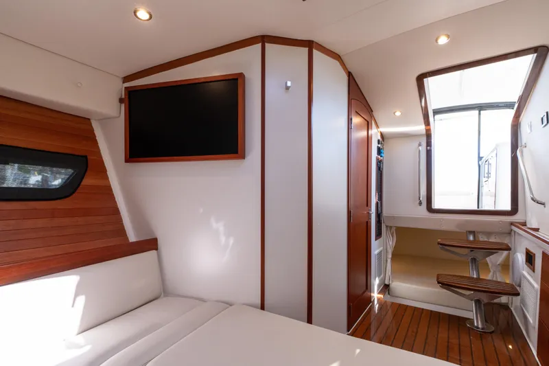 Middle Path Yacht Photos Pics Luxurious interior of 2023 MJM Yachts 4, featuring modern design and wood accents.