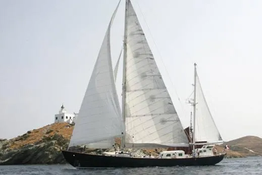 Amazon Yacht Photos Pics Vintage 1949 Liding&ouml;verken J.A. &Aring;berg sailboat near rocky coastline with lighthouse.