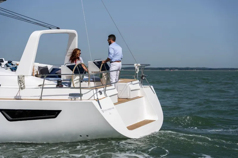 Off The Grid Yacht Photos Pics 2024 Southerly 420 yacht sailing with two people on deck in open water.