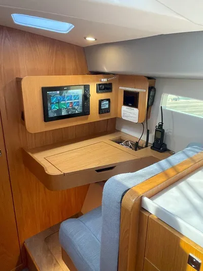 Off The Grid Yacht Photos Pics 2024 Southerly 420 yacht interior with navigation station and modern equipment.