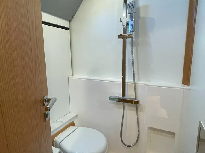 Off The Grid Yacht Photos Pics 2024 Southerly 420 yacht bathroom with modern shower and toilet.