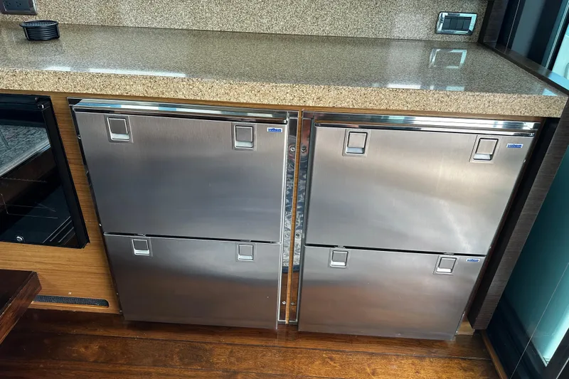 Salty Sam Yacht Photos Pics Stainless steel drawers in 2014 Tiara 5000 Coupe yacht interior.