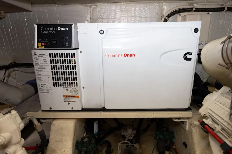 Salty Sam Yacht Photos Pics Cummins Onan generator in 2014 Tiara 5000 Coupe engine room.