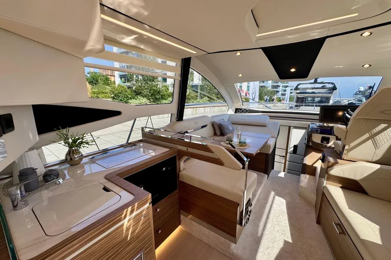  Yacht Photos Pics Luxurious interior of 2025 Cobrey 42 FLY yacht with modern furnishings and elegant design.