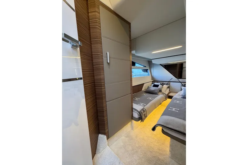 Yacht Photos Pics Luxurious interior of 2025 Cobrey 42 FLY yacht with modern twin beds and elegant design.