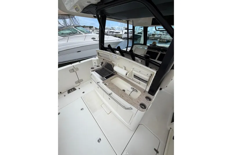  Yacht Photos Pics 2022 Boston Whaler 380 Outrage interior with sleek design and modern amenities.