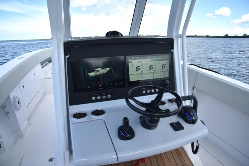  Yacht Photos Pics Helm of 2025 Jupiter 380 LS boat with advanced navigation displays.