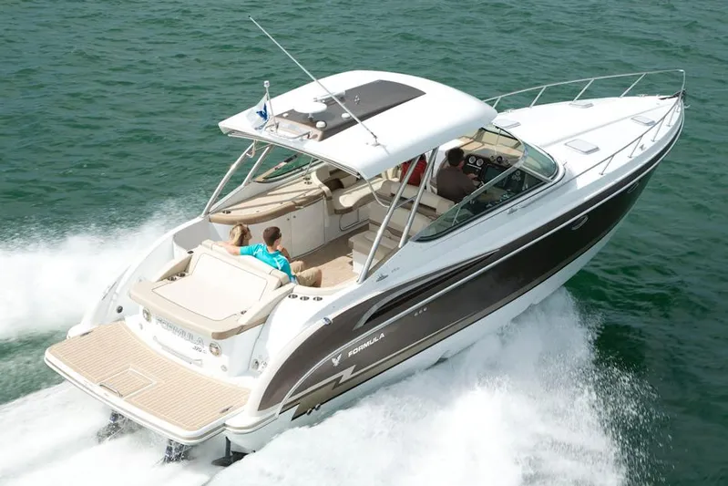 Wet Benefits Yacht Photos Pics Manufacturer Provided Image: 2015 Formula 370 Super Sport boat cruising on the water.