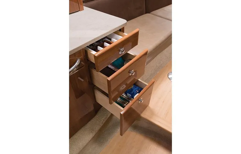 Wet Benefits Yacht Photos Pics Manufacturer Provided Image: Open drawers in the cabin of a 2015 Formula 370 Super Sport boat.