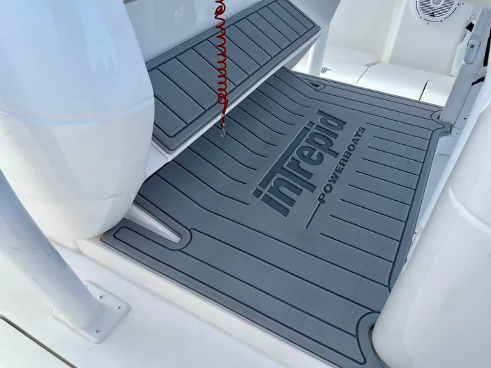 Towa VII Yacht Photos Pics 2016 Intrepid 375 Center Console boat deck with branded mat.