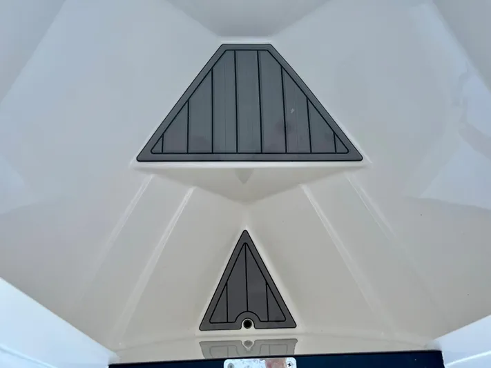 Towa VII Yacht Photos Pics 2016 Intrepid 375 Center Console bow storage compartments.