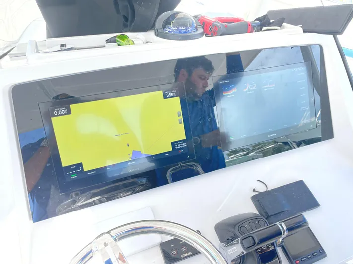 Towa VII Yacht Photos Pics 2016 Intrepid 375 Center Console dashboard with navigation and control screens.