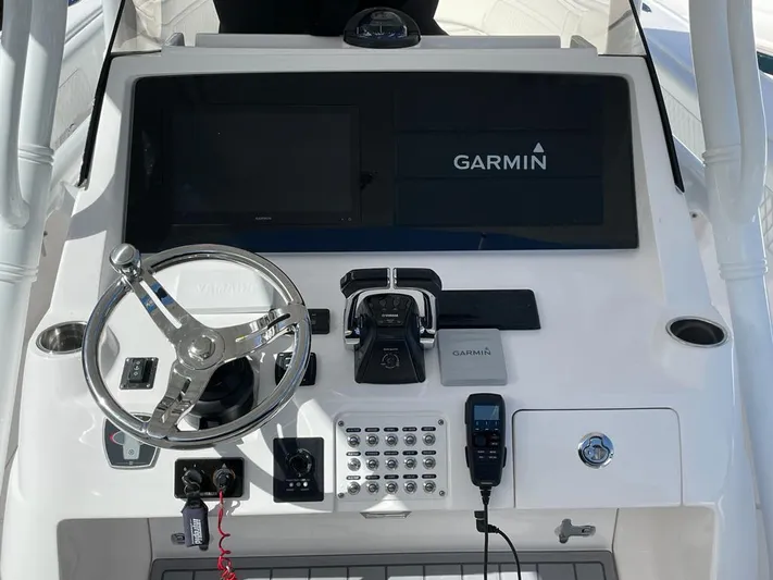 Towa VII Yacht Photos Pics 2016 Intrepid 375 Center Console helm with Garmin navigation system.
