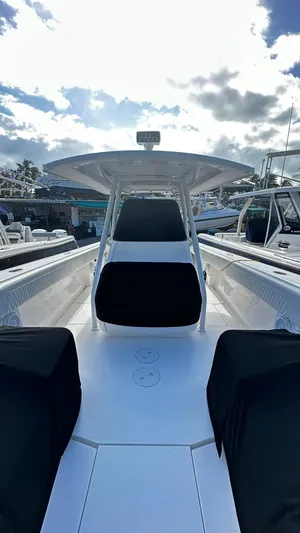 Towa VII Yacht Photos Pics 2016 Intrepid 375 Center Console boat with black seating and white deck.