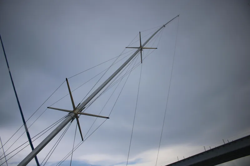 Double Deese Yacht Photos Pics Tall ship mast against cloudy sky, Viking Fish 1989 model.
