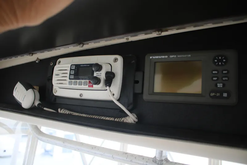 Double Deese Yacht Photos Pics Viking 1989 boat radio and GPS display in cockpit.