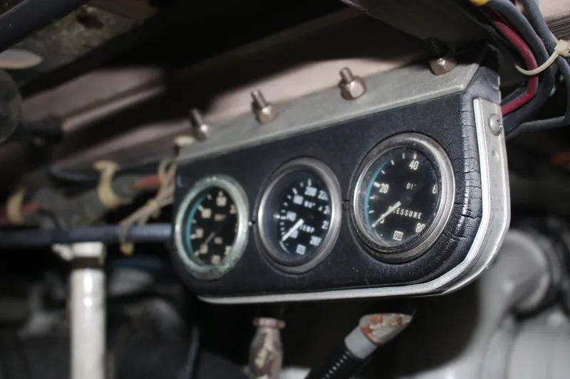 Double Deese Yacht Photos Pics 1989 Viking Fish dashboard gauges with vintage design and visible wiring.