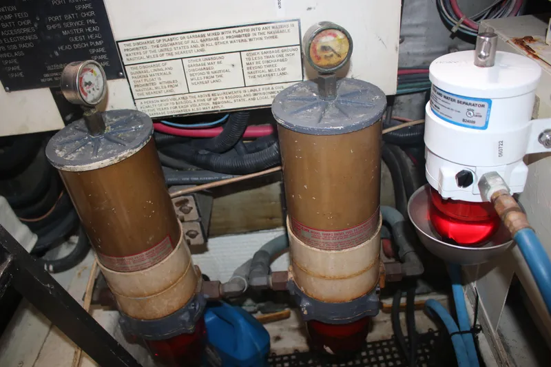Double Deese Yacht Photos Pics Engine room of a 1989 Viking fish boat with fuel filters and gauges.