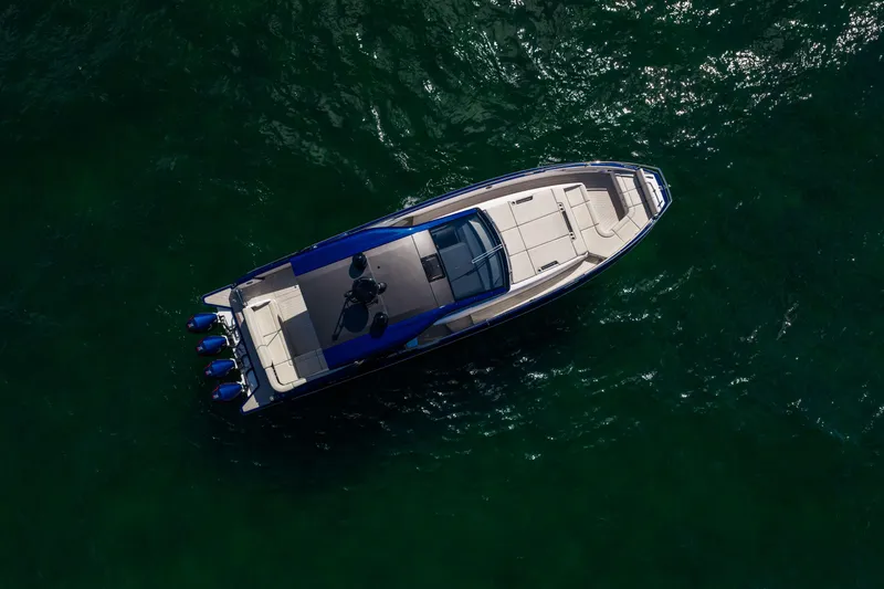  Yacht Photos Pics Aerial view of 2022 Azimut Verve 47 yacht on green water.