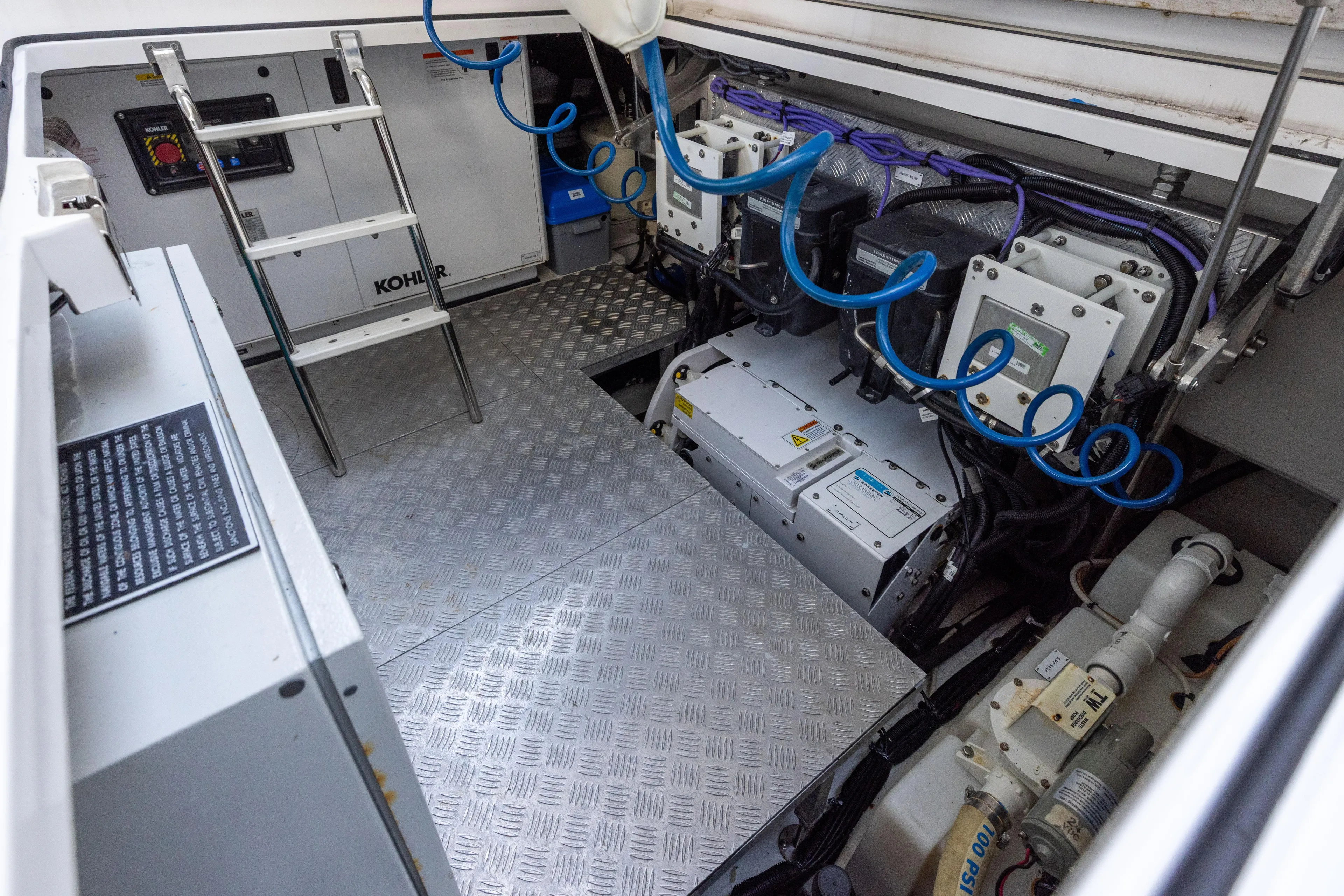  Yacht Photos Pics Engine room of 2022 Azimut Verve 47 yacht with Kohler generator and equipment.