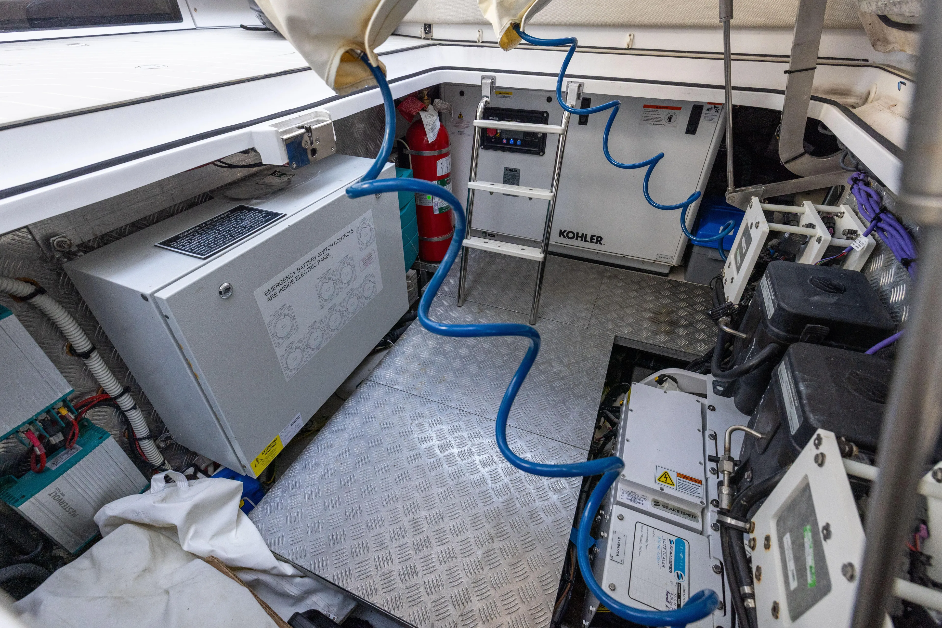  Yacht Photos Pics Engine room of 2022 Azimut Verve 47 yacht with Kohler generator and electrical systems.