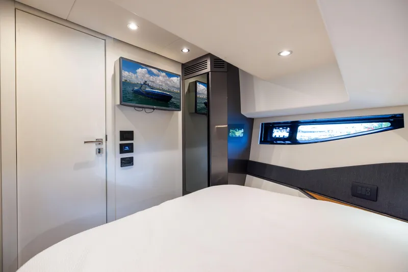  Yacht Photos Pics Luxurious interior of 2022 Azimut Verve 47 yacht cabin with modern amenities.