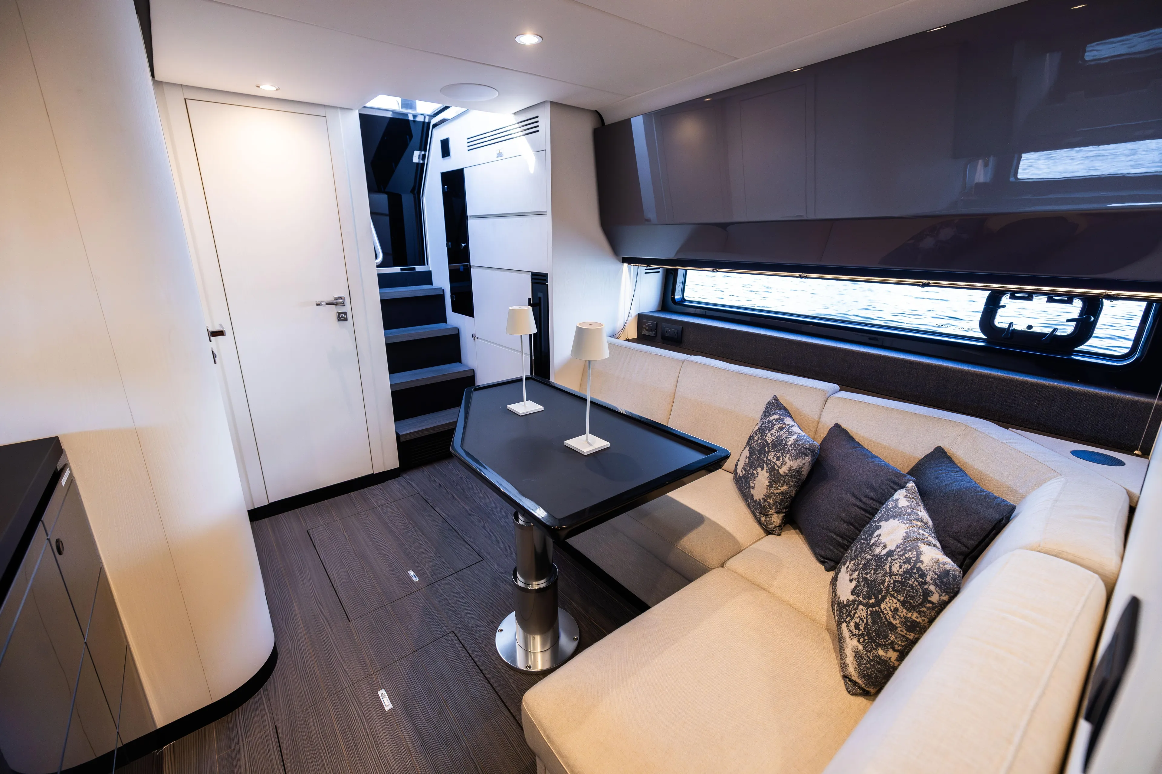  Yacht Photos Pics Luxurious interior of 2022 Azimut Verve 47 yacht with modern seating and elegant decor.